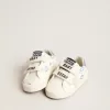 Baby Old School avec étoile en daim et languette en cuir bleu clair au talon Baby Old School avec étoile en daim et languette en cuir bleu clair au talon
