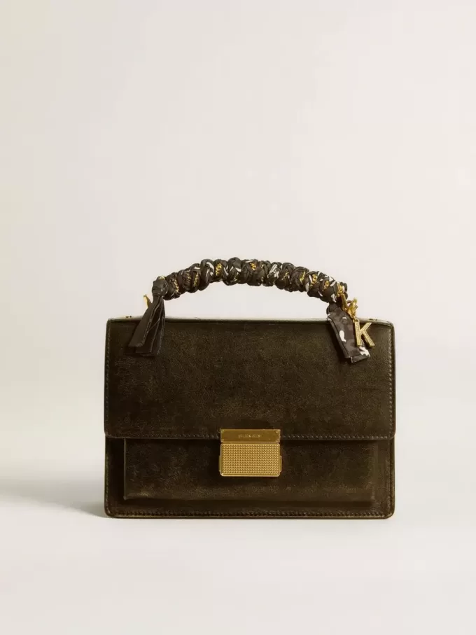 Charm en tissu tressé noir avec chaîne en laiton