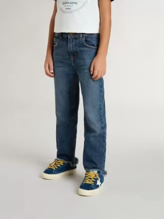 Jean pour garçon avec bord brut et broderies