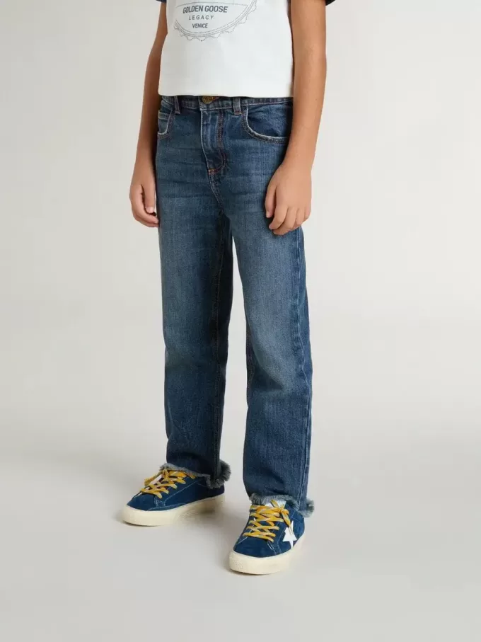 Jean pour garçon avec bord brut et broderies
