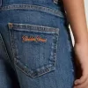 Jean pour garçon avec bord brut et broderies