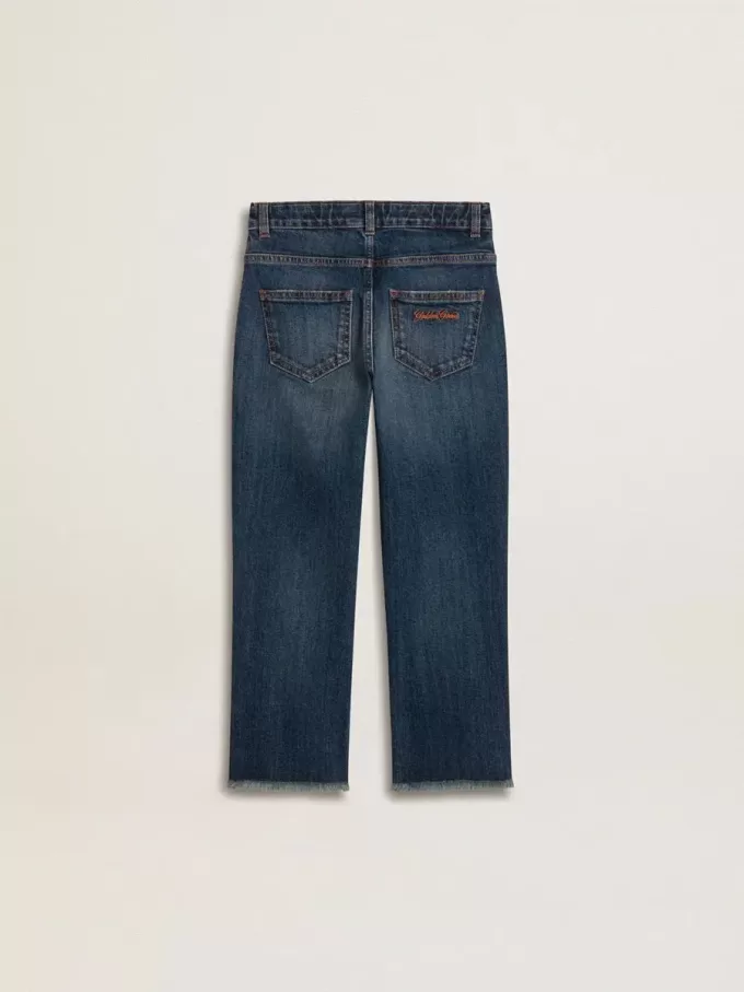 Jean pour garçon avec bord brut et broderies
