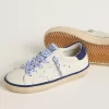 Junior Super-Star en cuir blanc avec talon en daim bleu Junior Super-Star en cuir blanc avec talon en daim bleu