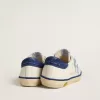Junior Super-Star en cuir blanc avec talon en daim bleu Junior Super-Star en cuir blanc avec talon en daim bleu