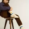 Junior Super-Star en cuir nappa avec une étoile beige et un renfort bleu au talon Junior Super-Star en cuir nappa avec une étoile beige et un renfort bleu au talon