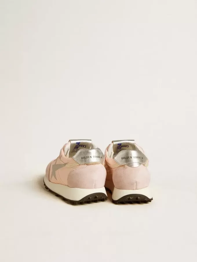 Marathon junior en nylon rose avec étoile imprimée et renfort en cuir au talon