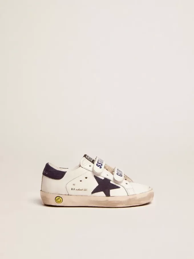 Modèle Junior Old School en cuir blanc avec étoile et languette au talon en daim bleu Modèle Junior Old School en cuir blanc avec étoile et languette au talon en daim bleu