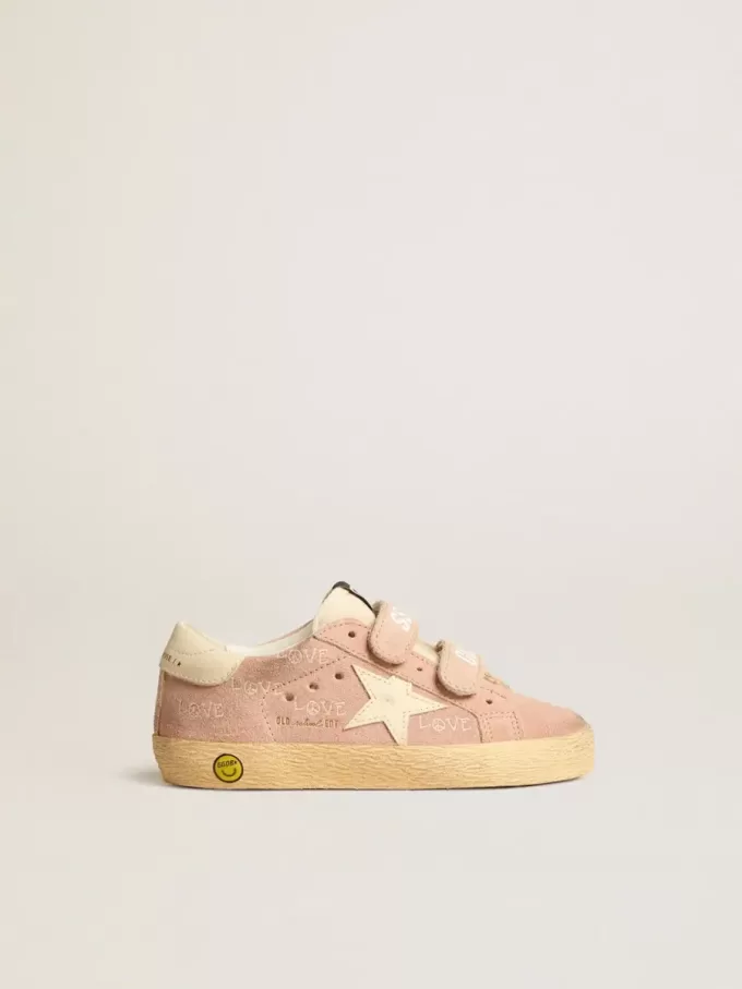 Modèle Old School Junior en daim rose avec étoile et languette au talon en cuir crème Modèle Old School Junior en daim rose avec étoile et languette au talon en cuir crème