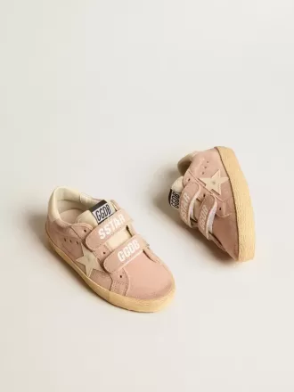 Modèle Old School Junior en daim rose avec étoile et languette au talon en cuir crème