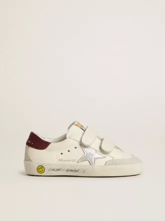 Modèle Old School pour adolescent avec étoile en cuir métallisé argenté et languette en daim violet au talon