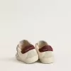 Modèle Old School pour adolescent avec étoile en cuir métallisé argenté et languette en daim violet au talon