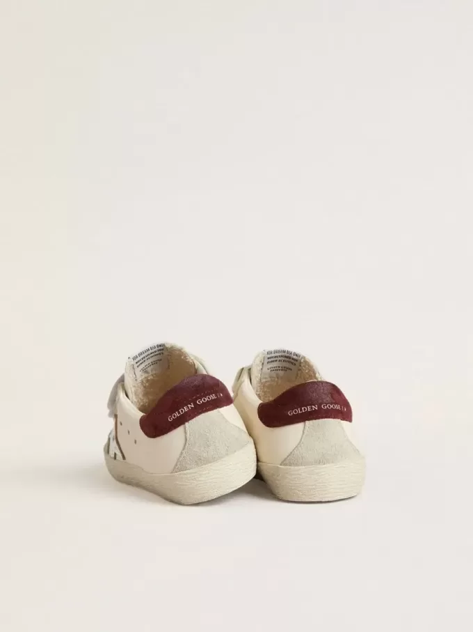 Modèle Old School pour adolescent avec étoile en cuir métallisé argenté et languette en daim violet au talon