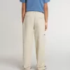 Pantalon chino beige pour enfant avec éclaboussures multicolores