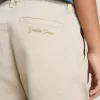 Pantalon chino beige pour enfant avec éclaboussures multicolores