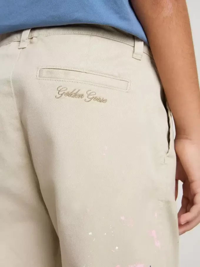Pantalon chino beige pour enfant avec éclaboussures multicolores
