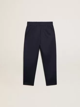Pantalon de jogging bleu foncé avec bande blanche et étoiles contrastées