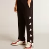 Pantalon de jogging noir pour garçon avec étoiles blanches