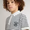 Polo blanc en coton pour garçon avec rayures bleu marine et broderies