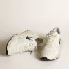 Running Sole en cuir blanc et mesh avec étoile en cuir laminé bleu