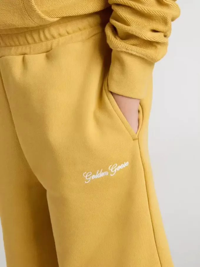 Short de jogging pour enfant jaune ocre avec broderie