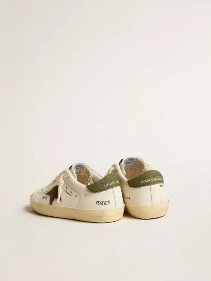 Super-Star Junior en cuir nappa avec étoile en daim et languette verte au talon