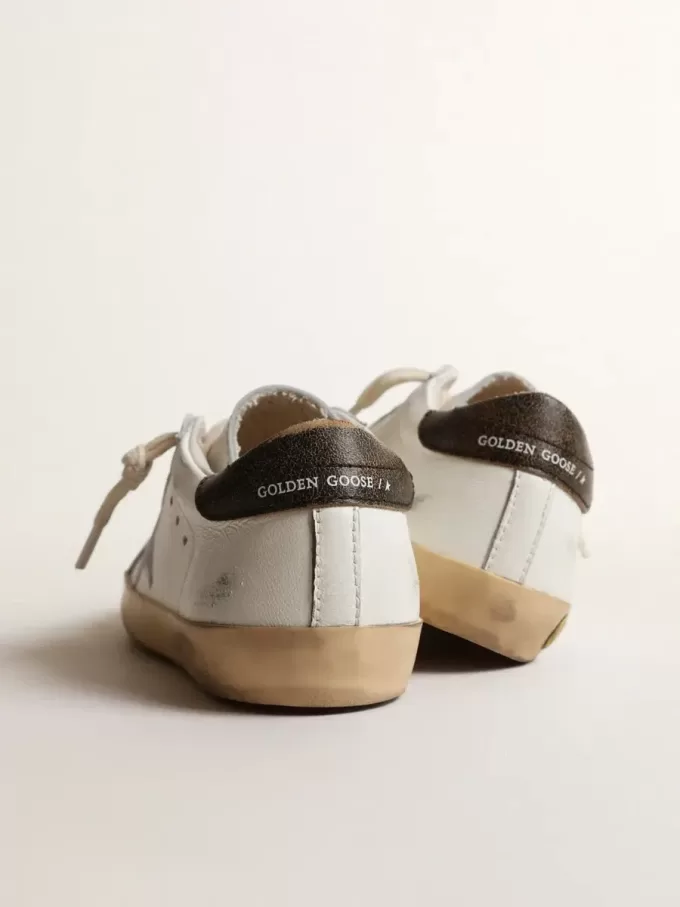 Super-Star Junior en cuir nappa avec étoile imprimée et languette noire au talon Super-Star Junior en cuir nappa avec étoile imprimée et languette noire au talon