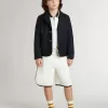 Sweat-shirt polo blanc en coton pour enfant, avec broderie sur la poitrine et imprimé dans le dos.