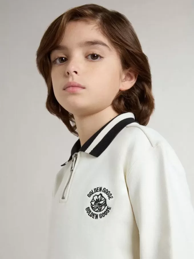 Sweat-shirt polo blanc en coton pour enfant, avec broderie sur la poitrine et imprimé dans le dos.