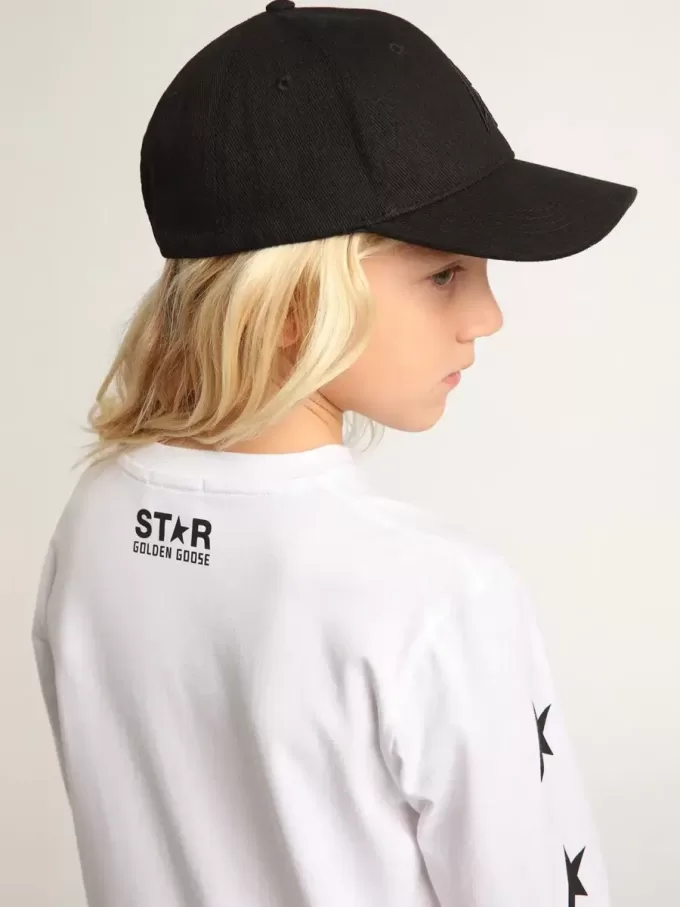 T-shirt blanc à manches longues avec étoiles noires contrastées