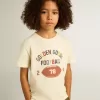 T-shirt pour garçon blanc délavé avec inscription multicolore