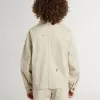 Veste beige pour enfant avec éclaboussures multicolores Veste beige pour enfant avec éclaboussures multicolores