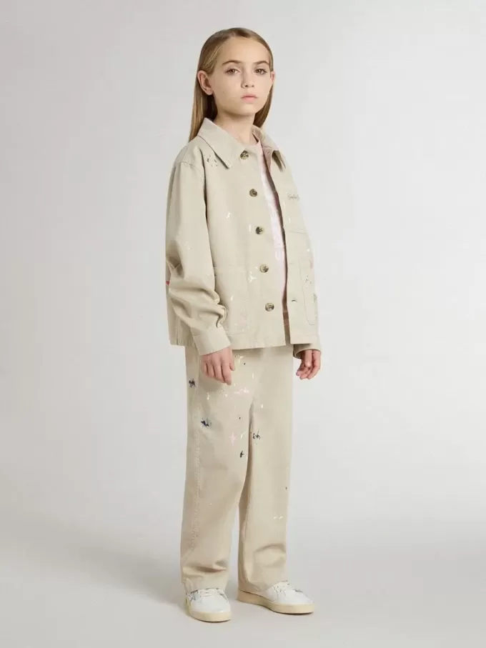 Veste beige pour enfant avec éclaboussures multicolores Veste beige pour enfant avec éclaboussures multicolores