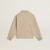 Veste beige pour enfant avec éclaboussures multicolores Veste beige pour enfant avec éclaboussures multicolores