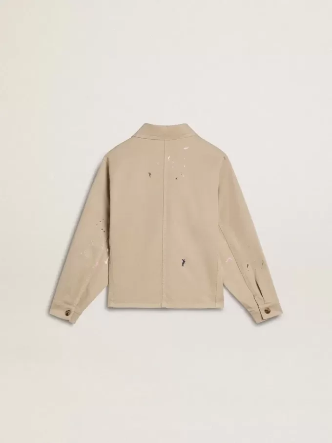 Veste beige pour enfant avec éclaboussures multicolores Veste beige pour enfant avec éclaboussures multicolores